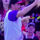 father catching ball with beer and baby
